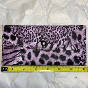 Purple and black clutch